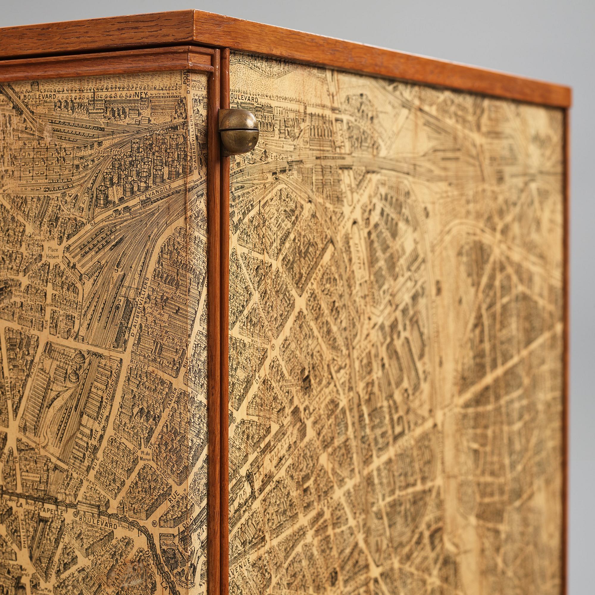 Josef Frank, a cabinet covered with Georges Peltier's 'Plan de Paris à vol d'oiseau', Svenskt Tenn, Stockholm, ca 1937-1943.