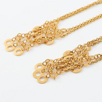 Siv Lagerström, två collier, guldfärgad metall.