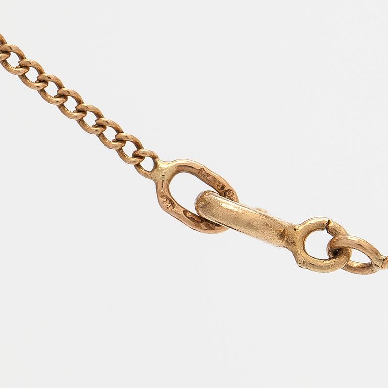 Halsband, 14K guld och syntetisk spinell. Salonius, Helsingfors.
