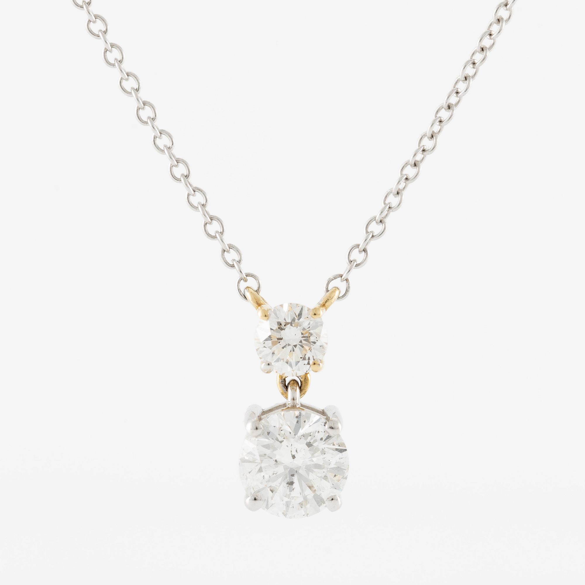 Collier 18K guld med två briljantslipade diamanter, medföljande report IGI.