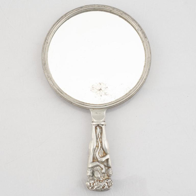 A pewter hand mirror, model A148, Firma Svenskt Tenn, Stockholm 1920's/30s.